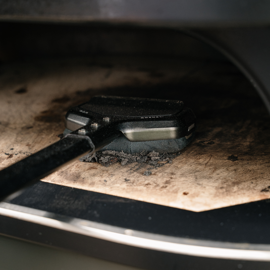 Cleaning a pizza oven stone with the Gozney M.O.P.